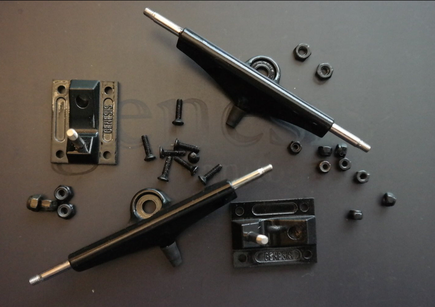 Black Genesis Trucks with LevelUp Bushings