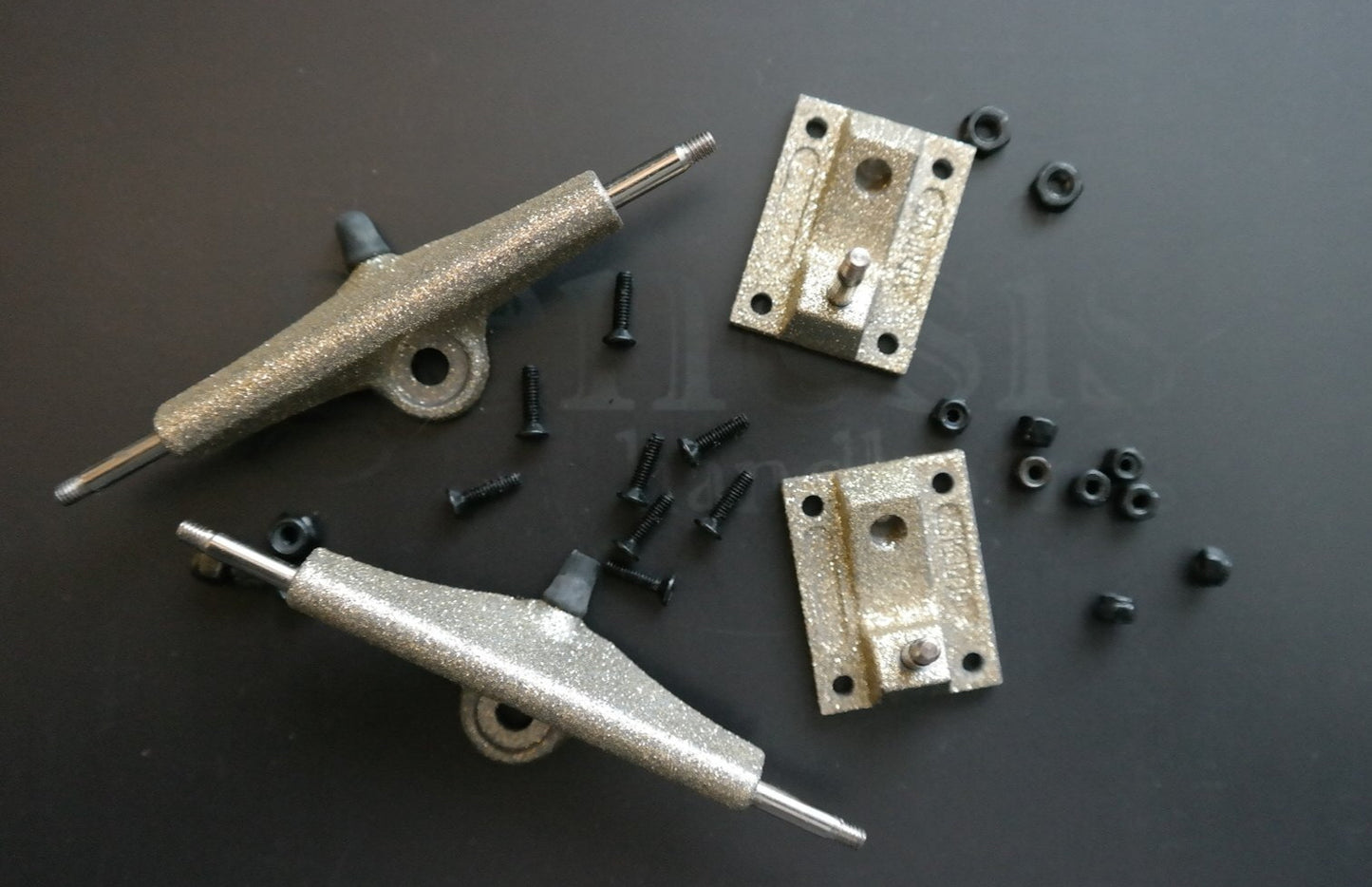 Glitter Gold Genesis Trucks with LevelUp Bushings